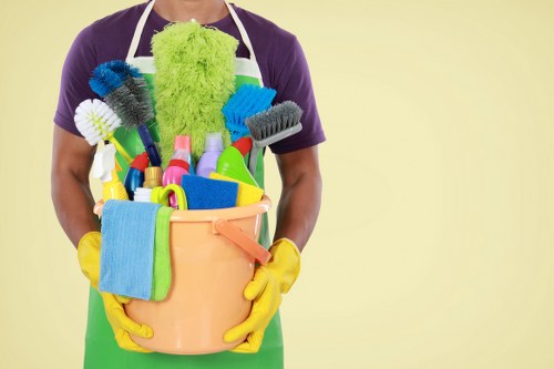 Carpet cleaning staff following safe work practices with equipment and protective gear